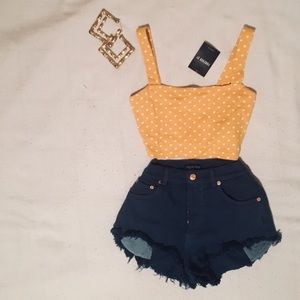 Blue high waisted shredded fashion nova shorts🕶